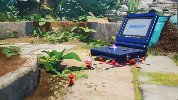 Pikmin carrying a Game Boy Advance SP
